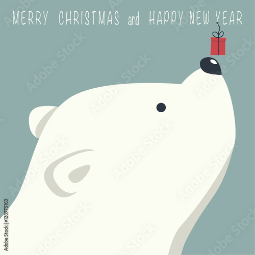 The cover design. Depicts face little polar bear with gift box. Phrase merry Christmas and a happy New year on blue background.