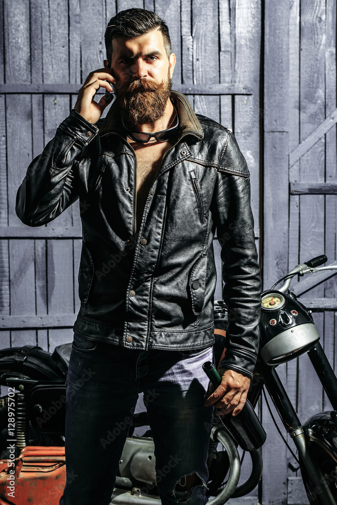 Bearded man hipster biker