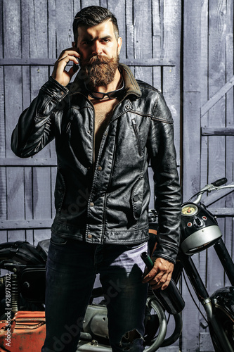 Fotografie Bearded man hipster biker