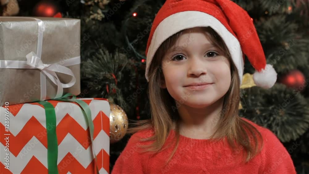 Beautiful little girl expressing excitement of Christmas coming ...