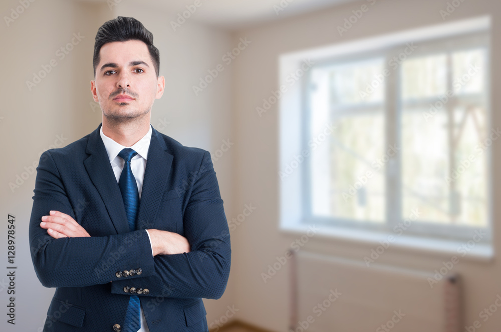 Portrait of young realtor with arms crossed Portrait of young realtor with arms crossed
