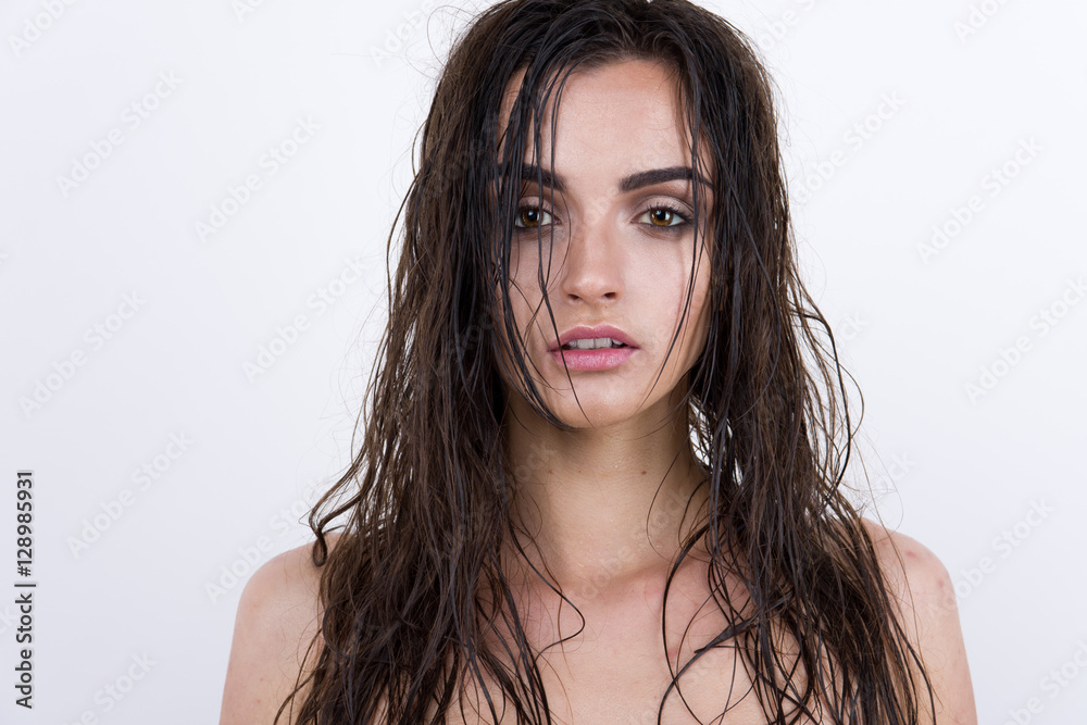 Sexy woman with wet hair beauty on white Sexy woman with wet hair beauty on white