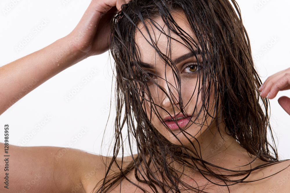 Sexy woman with wet hair beauty on white Sexy woman with wet hair beauty on white