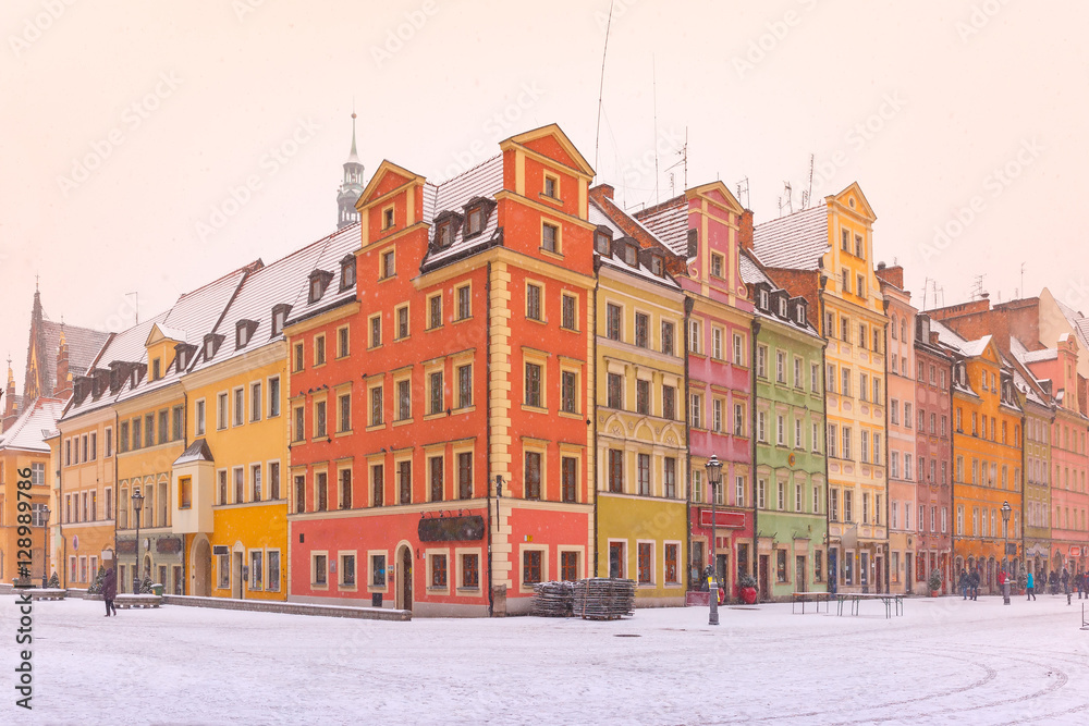 Multicolored traditional historical houses on Market square in the winter morning, Old Town of Wroclaw, Poland