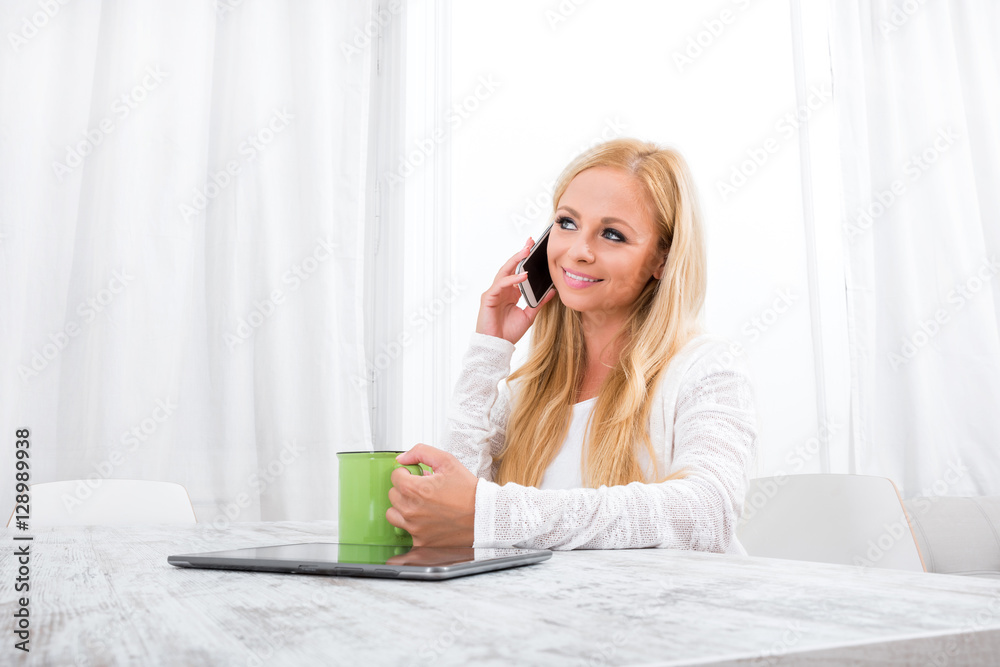 A beautiful young woman at a table A beautiful young woman at a table