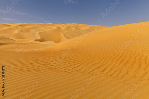 Sand desert during the day