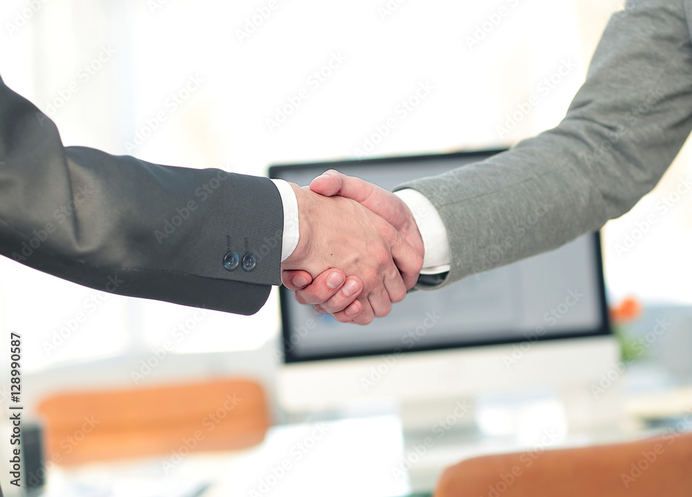 Close up of business handshake in the office