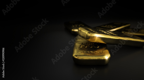 Commodities, Gold Bullion Bars Over Black photo