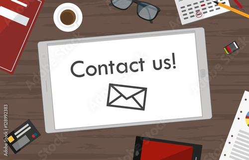 contact us - tablet on office desk