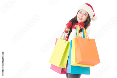 Christmas shopping woman with gift bag joyful