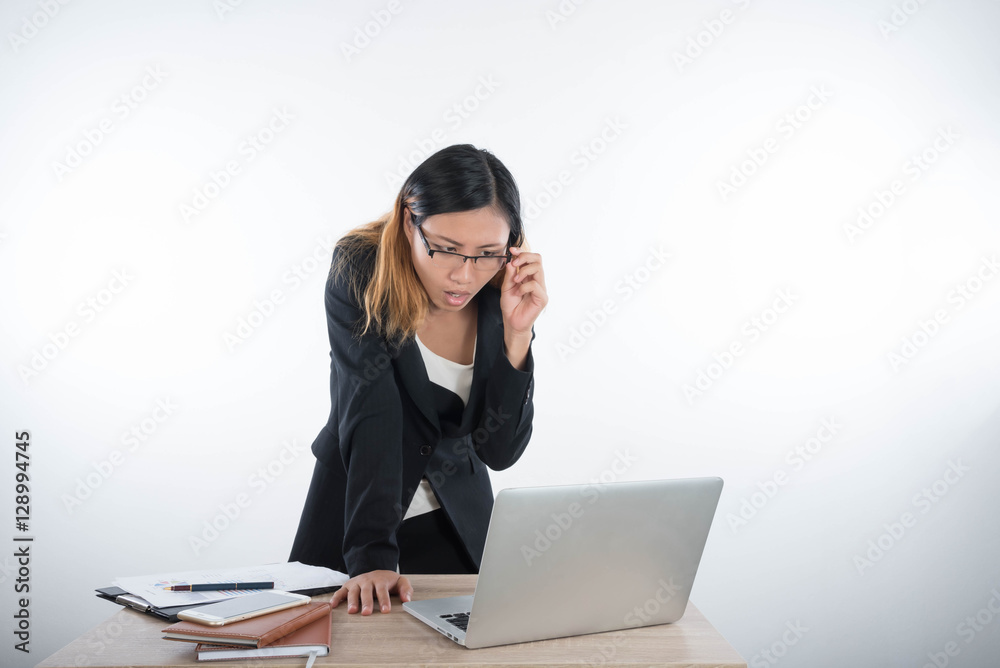 Young business woman with laptop notebook and smartphone in the Young business woman with laptop notebook and smartphone in the
