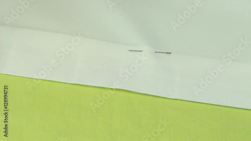 Tailor Stabs Edge of Product by Dressmaker Pin. Sewing of Curtains From Beige Fabric.