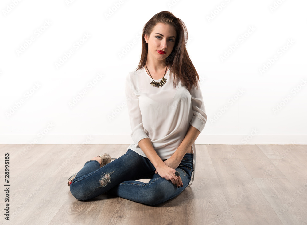 Young pretty model woman posing in studio