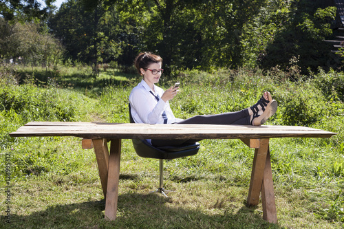 business woman taking a rest from everyday life photo