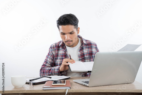 business man with laptop notebook and smartphone in the office
