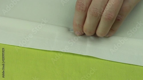 Tailor Smoothes the Fabric With Hand and Begins to Stab Edge of Product by Dressmaker Pins 1