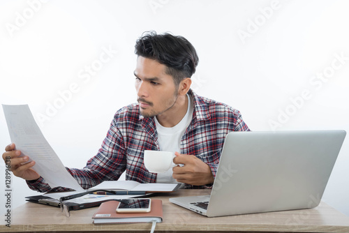 business man with laptop notebook and smartphone in the office