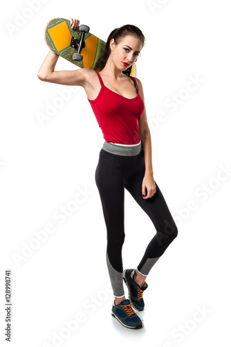 Pretty sport woman with skate