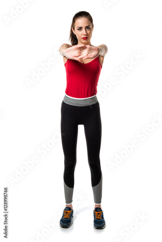 Pretty sport woman stretching © luismolinero