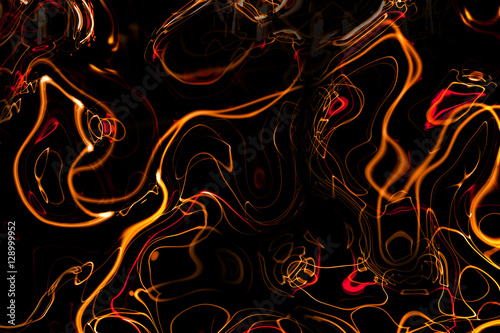 Futuristic abstract glowing background resembling motion blurred neon light curves. Digital artwork creative graphic design.