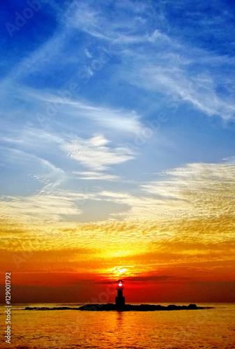 sunset on the beach at lighthouse