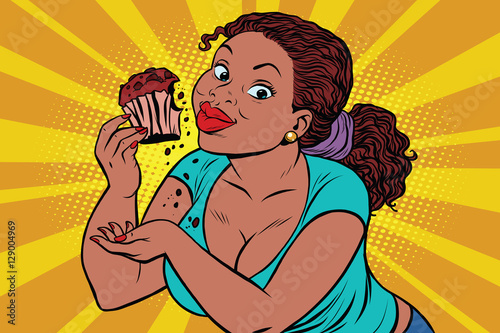 Diet concept woman eating cupcake