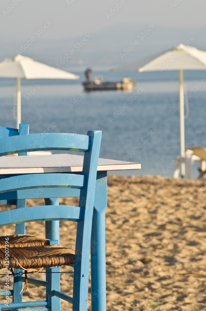 Details of a restaurant on a beach in Greece