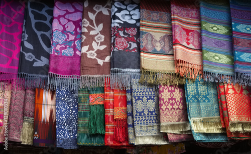 Colorful handmade batak-style scarfs at the market, Lake Toba, Indonesia