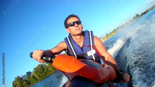 Man riding jet ski photo