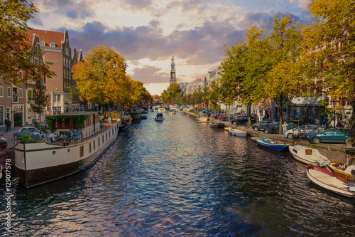 Photography Panorama of canal in old town at fall, day time in Amsterdam.