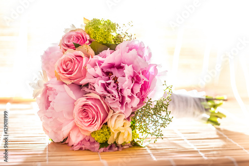 Beautiful pink wedding bouquet on white background