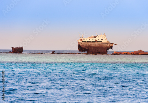 The ship is stranded on a coral reef in the Red Sea. 