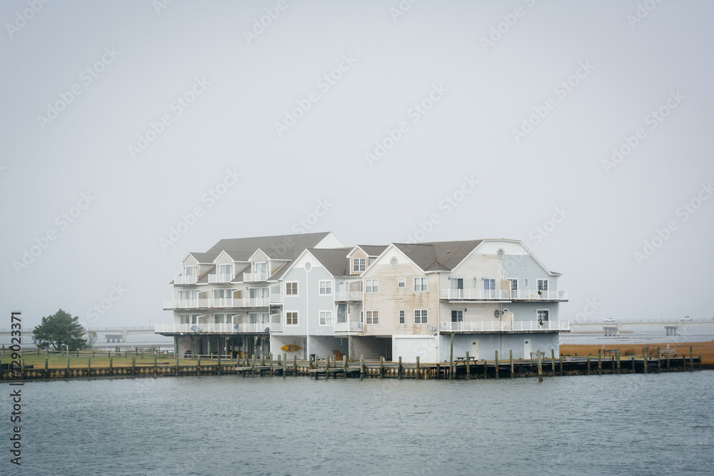 Houses along Chincoteague Bay, in Chincoteague Island, Virginia. Houses along Chincoteague Bay, in Chincoteague Island, Virginia.