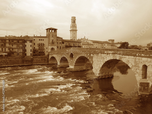 The Ponte Pietra in Sepia Tone, the Roman Arch Bridge over the Adige River in Verona of Italy