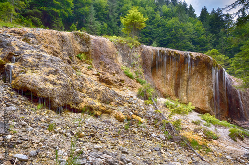 Urlatoarele waterfall in Ciucas mountains, Vama Buzului, Romania photo