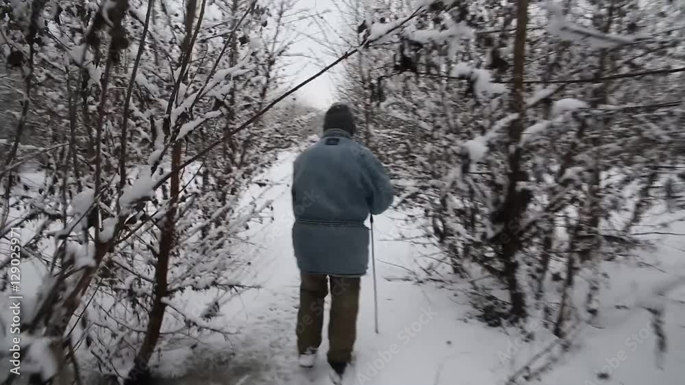 Man walking in beautiful winter landscape Man walking in beautiful winter landscape