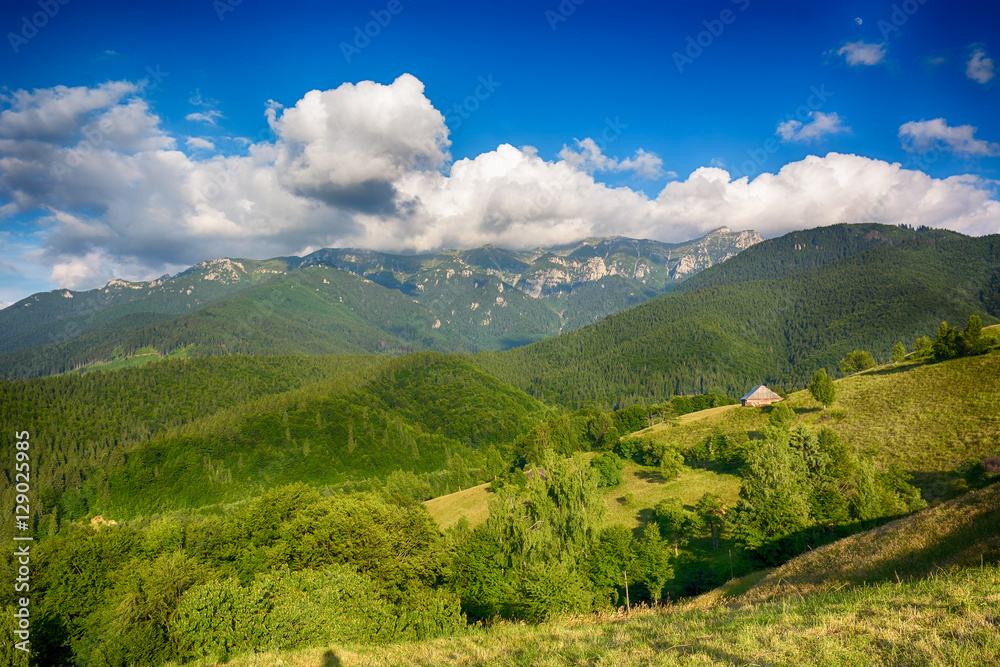Fototapeta premium Evening, sunset on mountain hills of Simon village. Bran.
