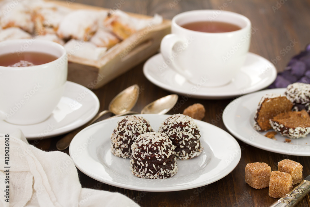chocolate cookies with cups of tea chocolate cookies with cups of tea