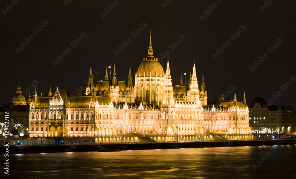 The Parliament of Budapest and the Danube in the night