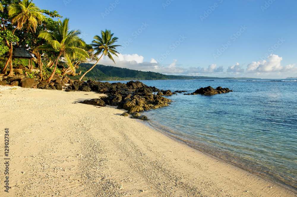 Sandy beach in Lavena village on Taveuni Island, Fiji Sandy beach in Lavena village on Taveuni Island, Fiji