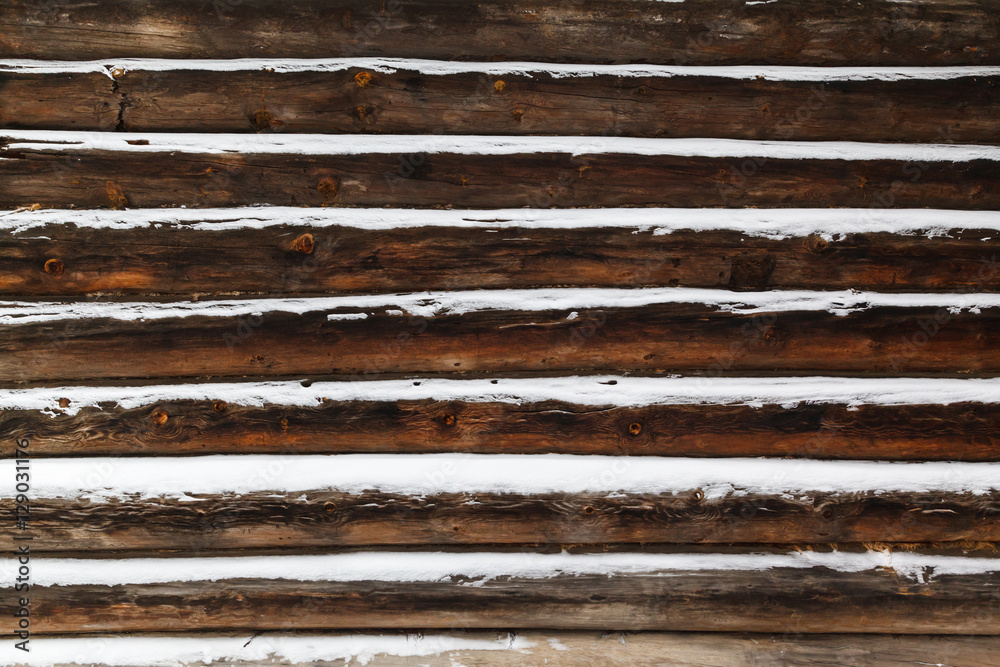 Traditional rural wooden house at winter Traditional rural wooden house at winter