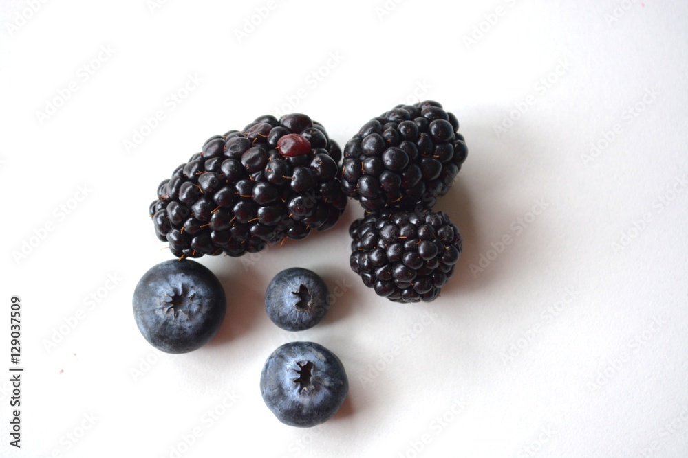 Three blackberries and three blueberries Three blackberries and three blueberries
