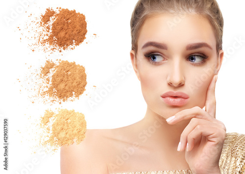Beauty portrait of a young girl.Close up of a make up powder on white background