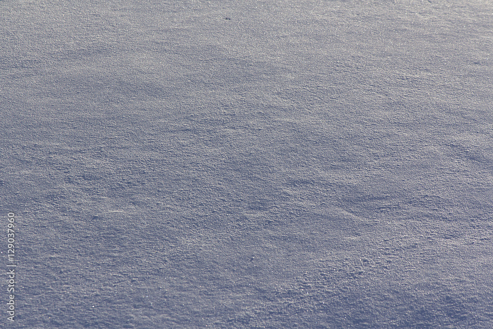 Surface of snow with texture for use as background Surface of snow with texture for use as background