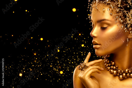 Beauty fashion model girl with golden skin, makeup and hairstyle © Subbotina Anna
