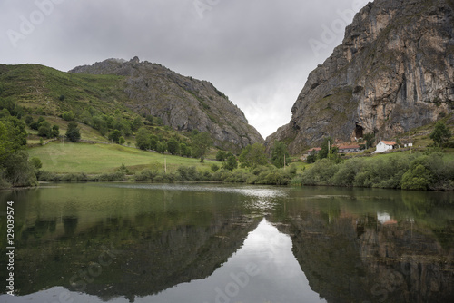 Fototapeta Naklejka Na Ścianę i Meble -  Views of El Valle Reservoir, in Valle del Lago, Somiedo Nature Reserve. It is located in the central area of the Cantabrian Mountains in the Principality of Asturias in northern Spain