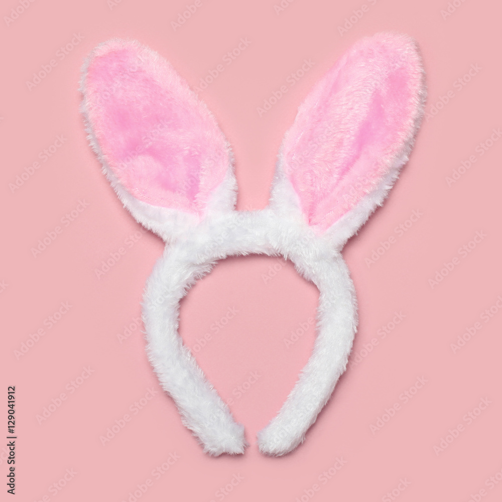 Sweet fluffy rabbit ears isolated on a colorful pink background, Sweet fluffy rabbit ears isolated on a colorful pink background,