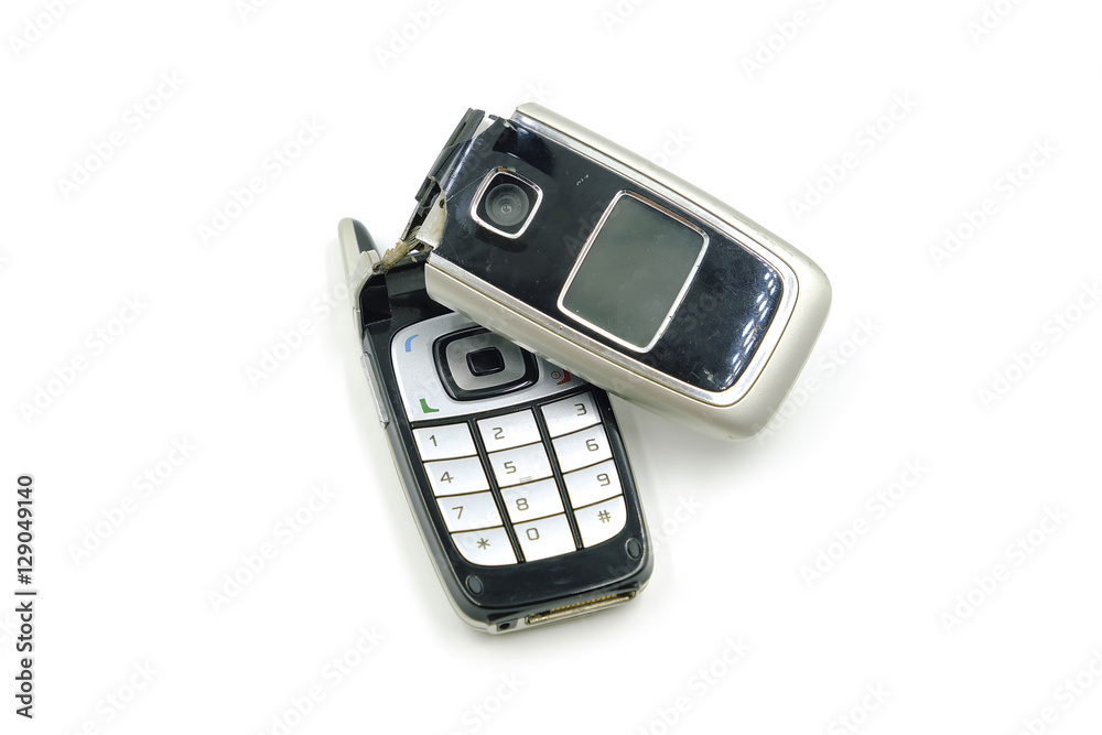 Broken phone on white background Broken phone on white background