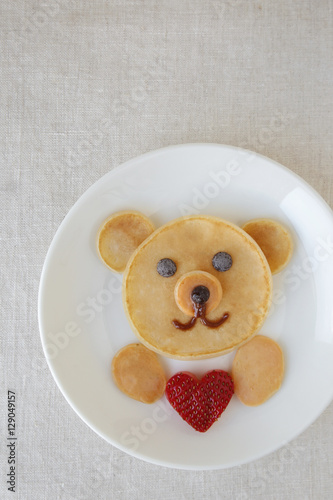 Bear holding love heart pancake breakfast, fun Valentines food art for kids