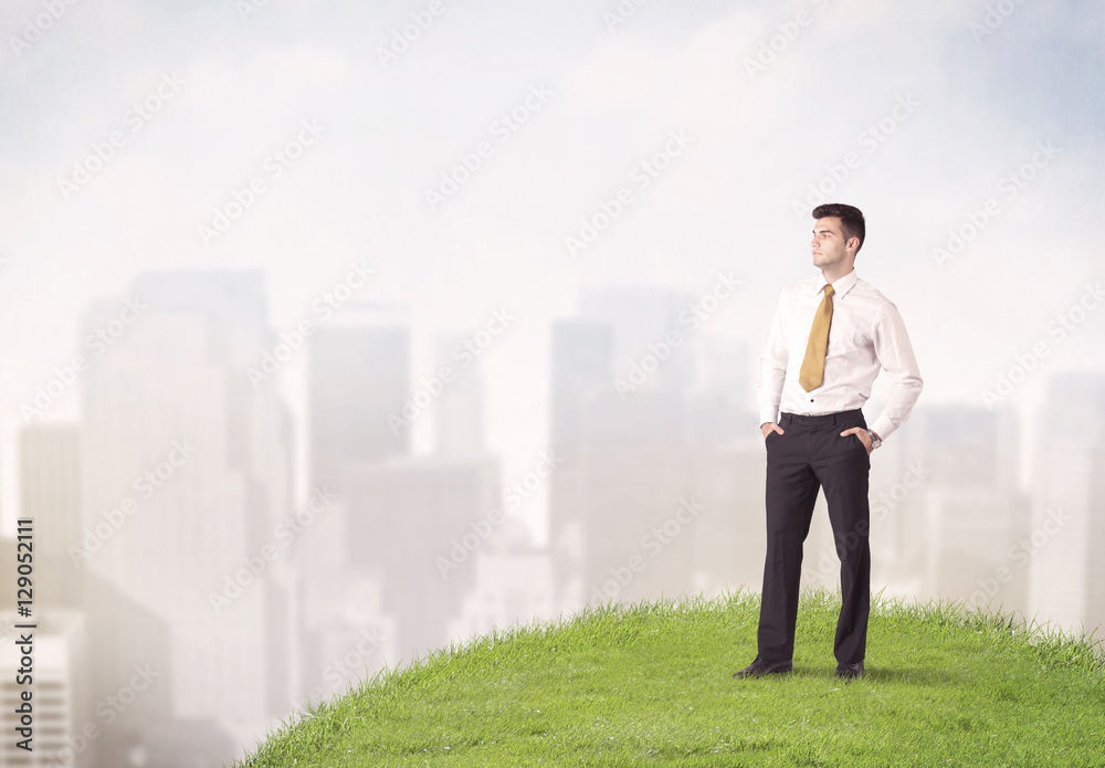 man standing in front of city landscape man standing in front of city landscape